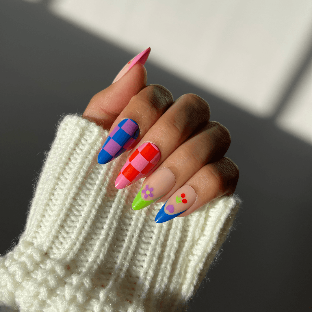 Colorful checkered press-on nails with floral accents