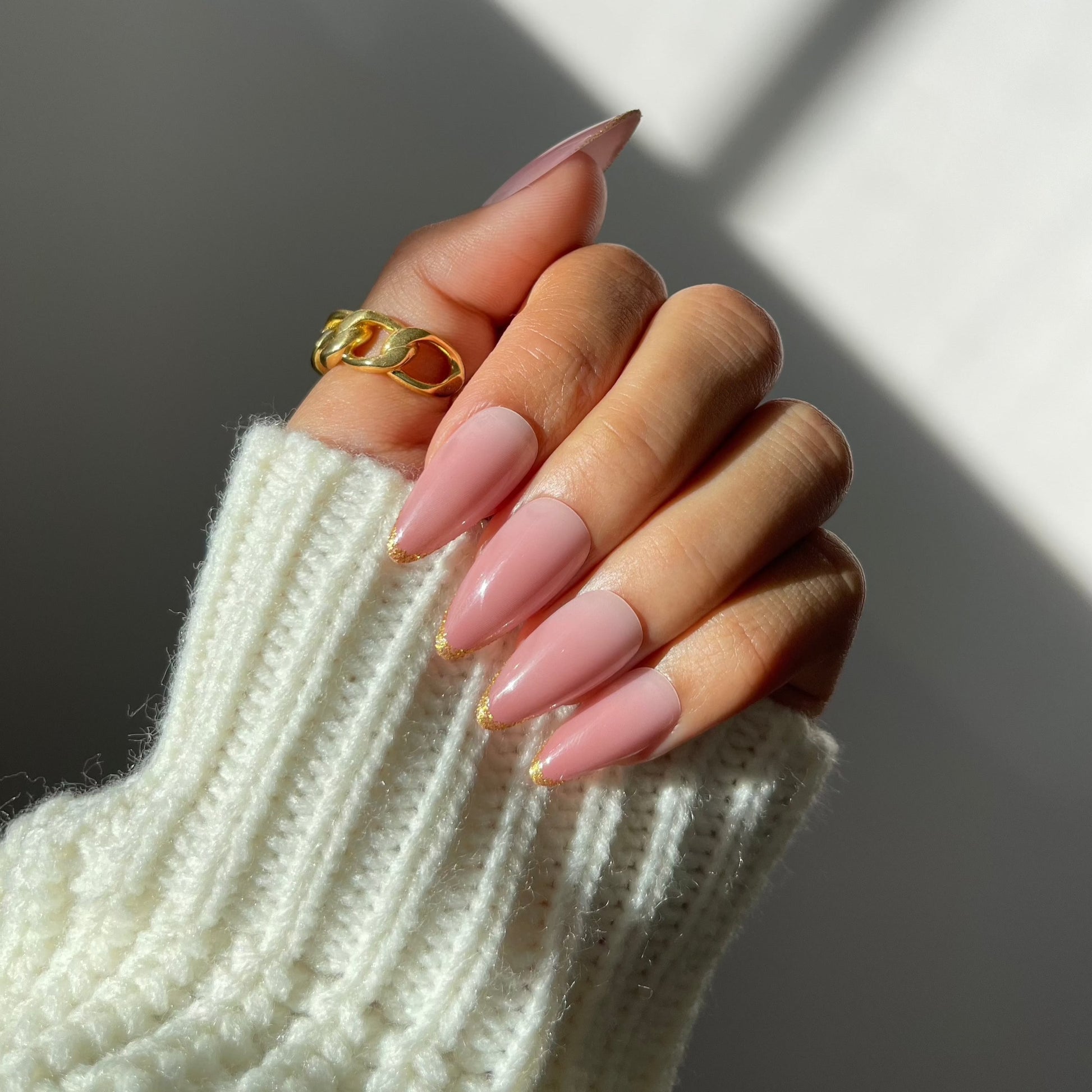 Rosy ombre almond press-on nails with glittery tips