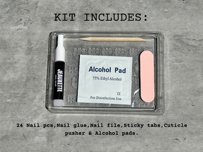 Esme nail kit contents including glue, file, and alcohol pad